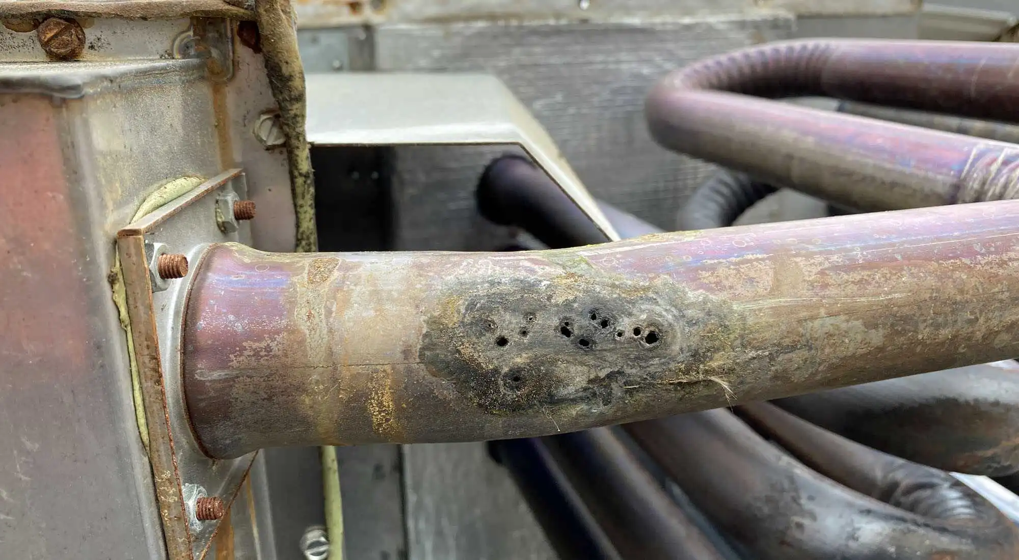 Furnace heat exchanger being inspected by Mechanical Extremes for safety